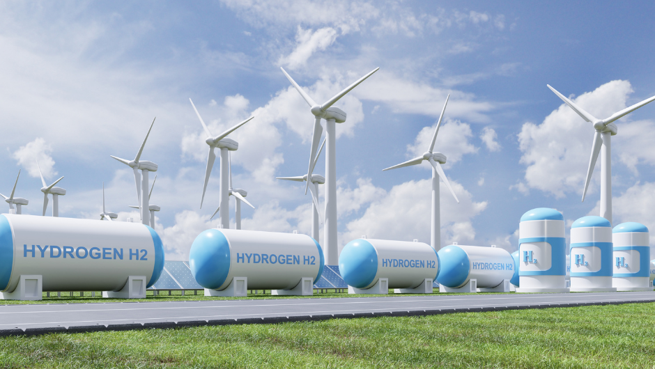 green hydrogen mock up windmills with hydrogen tanks