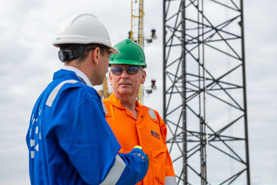 Offshore workers talking together